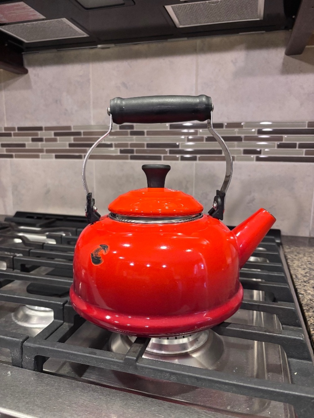Red Le Creuset porcelain enamel 1.7 Quart tea kettle